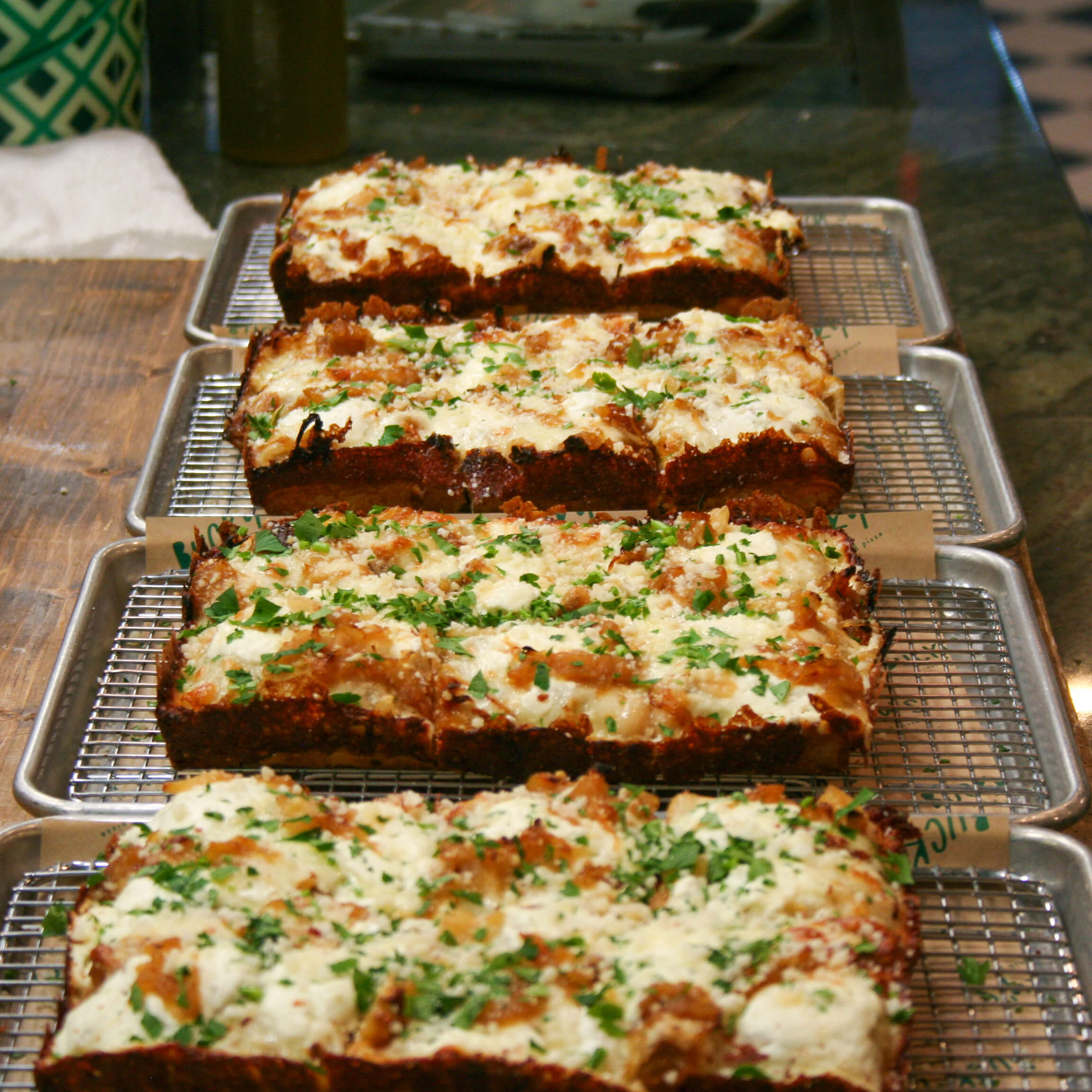 Thick pizza lined up (2) (1)